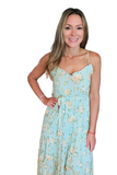 Mint colored floral spaghetto strap dress. Floral print has peach colored flowers