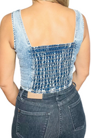 Back of a square neckline acid washed denim tank top, backing is an elastic smock. 