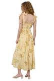 Back view of a yellow floral midi dress with lace tie straps and tiered skirt
