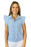 A smiling woman wearing a light blue and white vertically striped short-sleeve blouse with ruffled shoulders and front buttons, paired with white pants, against a plain white background.