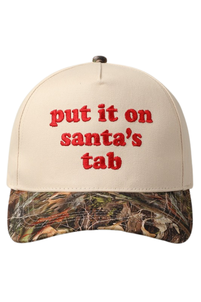 Put It On Santa’s Tab hat featuring red embroidery on a tan crown with a camo bill. Christmas camo snapback hat for holiday outfits and gifting.