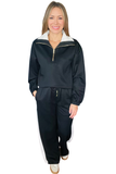 Black and ivory CloudKnit colorblock set with a half zip pullover, wide leg pants and soft cool-touch fabric for elevated everyday comfort.