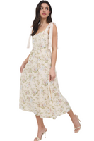 woman wearing a floral midi dress with satin tie straps and a corset style top