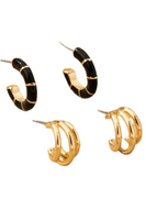 A pair of black and gold hoops alongside a pair of triple hoop earrings