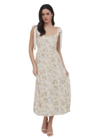 woman wearing a floral midi dress with satin tie straps and a corset style top