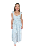 Full length light blue floral maxi dress with ruffle shoulder straps, sweetheart neckline, fitted bodice, tie waist detail, and flowy feminine skirt.
