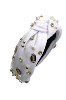 White tied headband with pearl, rhinestone and enamel footballs on it