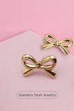 Gold bow stud earrings 