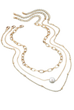 gold necklace set. set includes three individual necklaces, an oval link chain, a snake chain with a pearl, and a beaded chain necklace