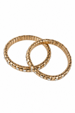 Two gold-toned segmented bangles, each set with small clear stones along the front edge, displayed on a plain white background.