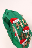 unclose photo of green Christmas headband with ho ho ho in beading and rhinestone detailing 