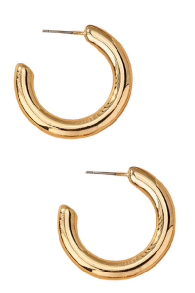 A pair of medium-sized gold hollow tube puffy hoop earrings with a polished finish, measuring 1 inch in diameter. The lightweight design features a modern puffy silhouette and secure post-back closures, displayed on a white background.