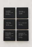 Six black square panels with white printed poetry quotes arranged in a 2x3 grid on a light textured background.