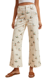 Close-up of cream mallard print high rise wide leg cropped jeans in stretch denim with front seam detail and belt loops.