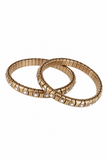 Two metallic gold bangles with small clear rhinestone accents, arranged overlapping on a plain white background.