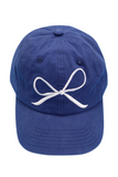 Navy blue baseball hat with a white embroidered bow on the front 