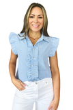 A smiling woman wearing a light blue and white vertically striped ruffle-sleeve button-up blouse with white pants, photographed against a plain white background.