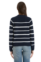 back of a navy high-neck sweater with white stripes