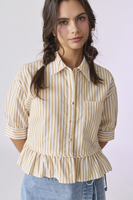 Woman wearing a white and tan striped collared button down 3/4 sleeve top. Top has peplum detailing and a front breast pocket. Shirt is paired with a light denim jean skirt 