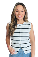 Woman wearing a white round neckline button down vest shirt with black thin stripes. The vest has front split hem and is paired with light blue denim jeans 