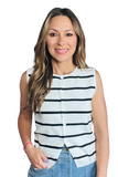 Woman wearing a white round neckline button down vest shirt with black thin stripes. The vest has front split hem and is paired with light blue denim jeans 