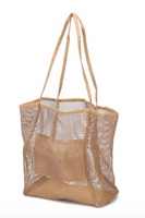 Tan fishnet beach bag, bottom is reinforced and there is a tan internal pocket