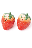 Two strawberry-shaped ceramic salt and pepper shakers on a plain white background.