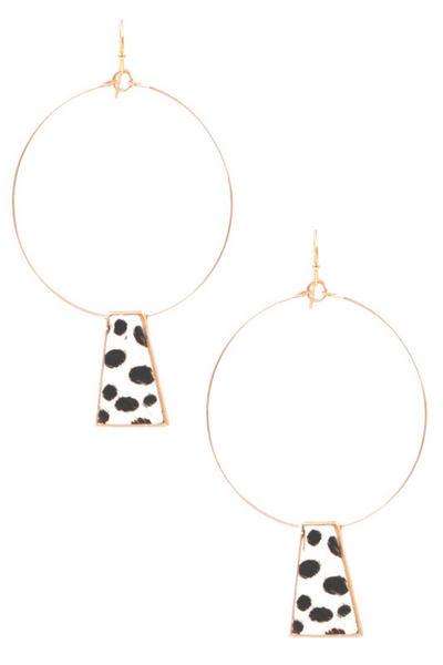 Gold wire hoop earrings with a faux fur spotted animal print hanging pendant 