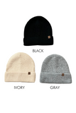 Black, ivory and gray colored knit beanies