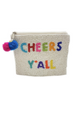White beaded coin purse that has 2 pom poms (1 pink and 1 blue) on the zipper and reads cheers y'all in multicolor. 