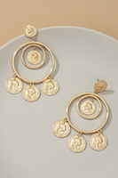 Gold double hoop drop earrings with gold coin charms. Earrings are photographed on a white and tan background 