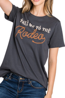 charcoal t-shirt with "take me to the rodeo" in white and brown font. Rodeo graphic is in a roped cursive font.