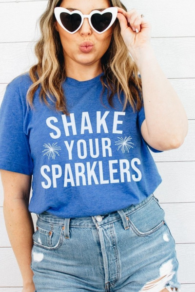 blue t-shirt with shake your sparklers written in white font with 2 firework bursts